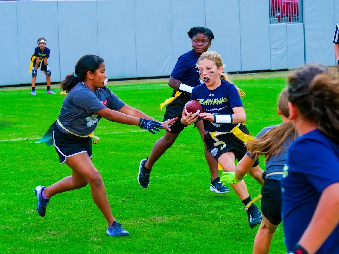 Girls flag football action shot